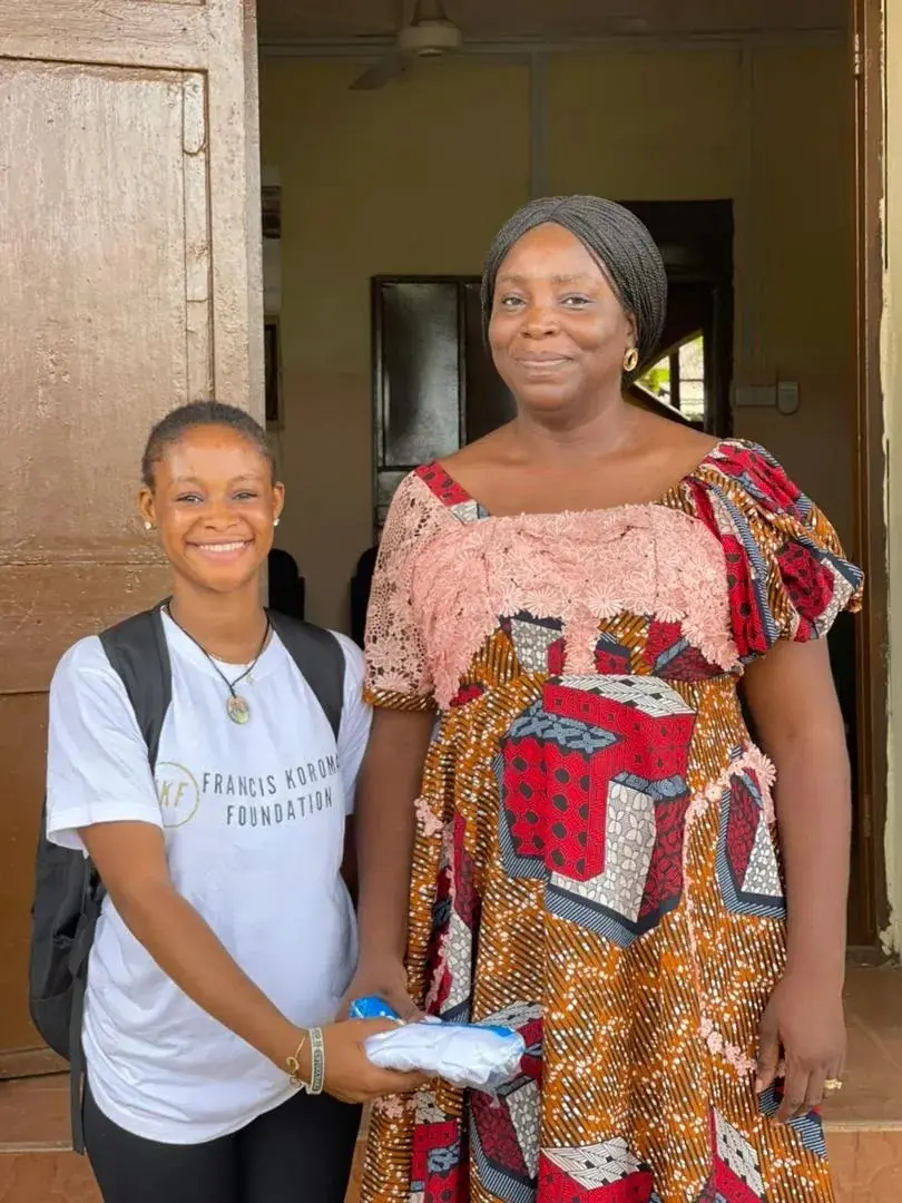 A volunteer and a teacher during a school visit