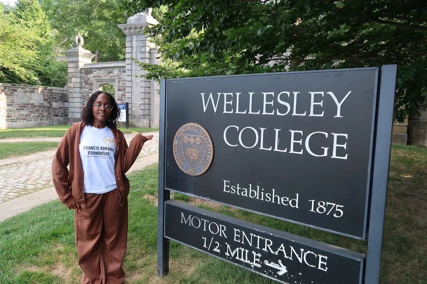 A scholar at the gates of Wellesley College