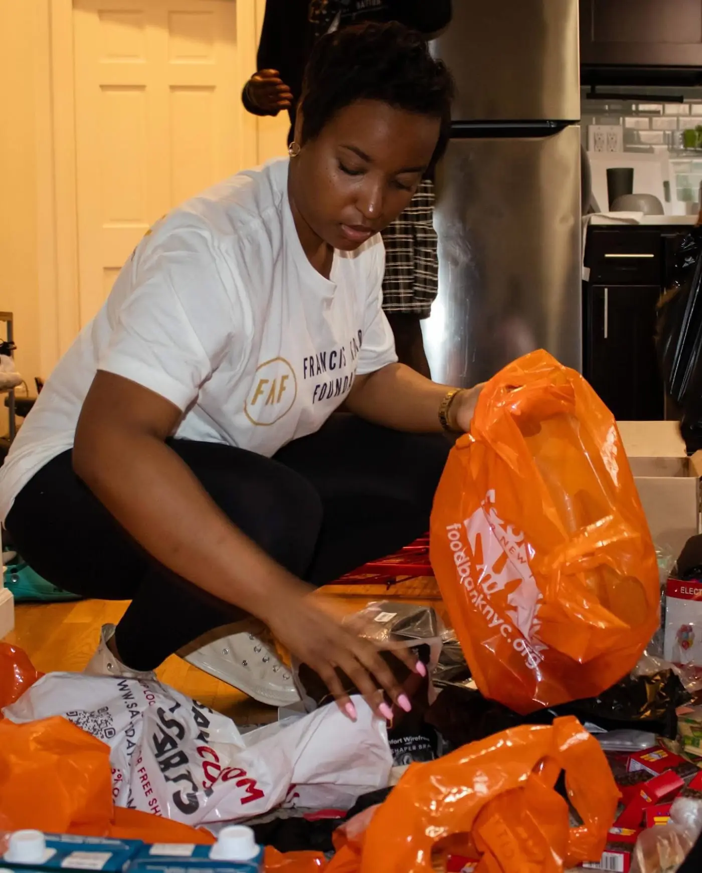 Packing parcels for the Youth Day donation drive